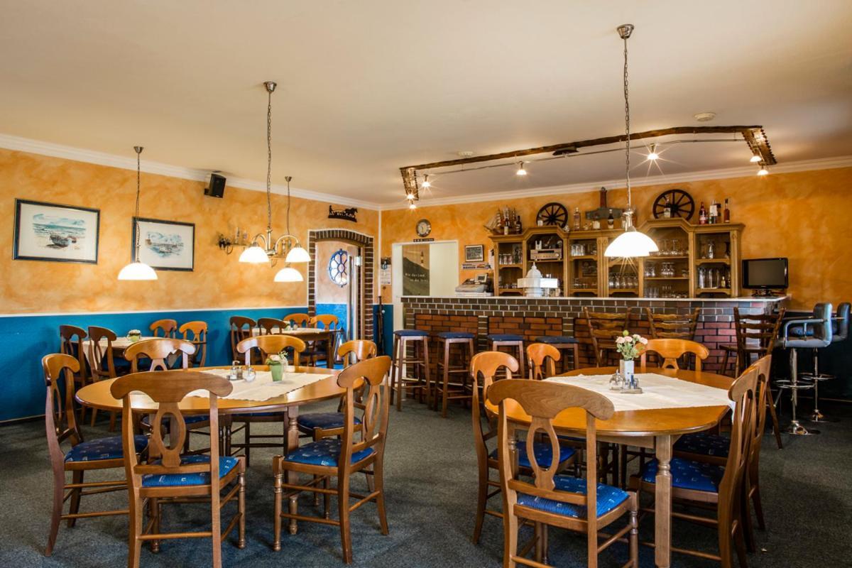 Logia Hotel garni Neuharlingersiel Esterno foto