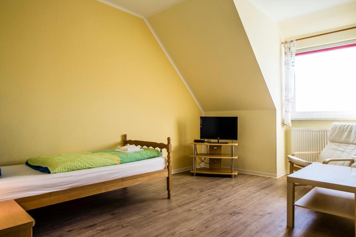 Logia Hotel garni Neuharlingersiel Esterno foto