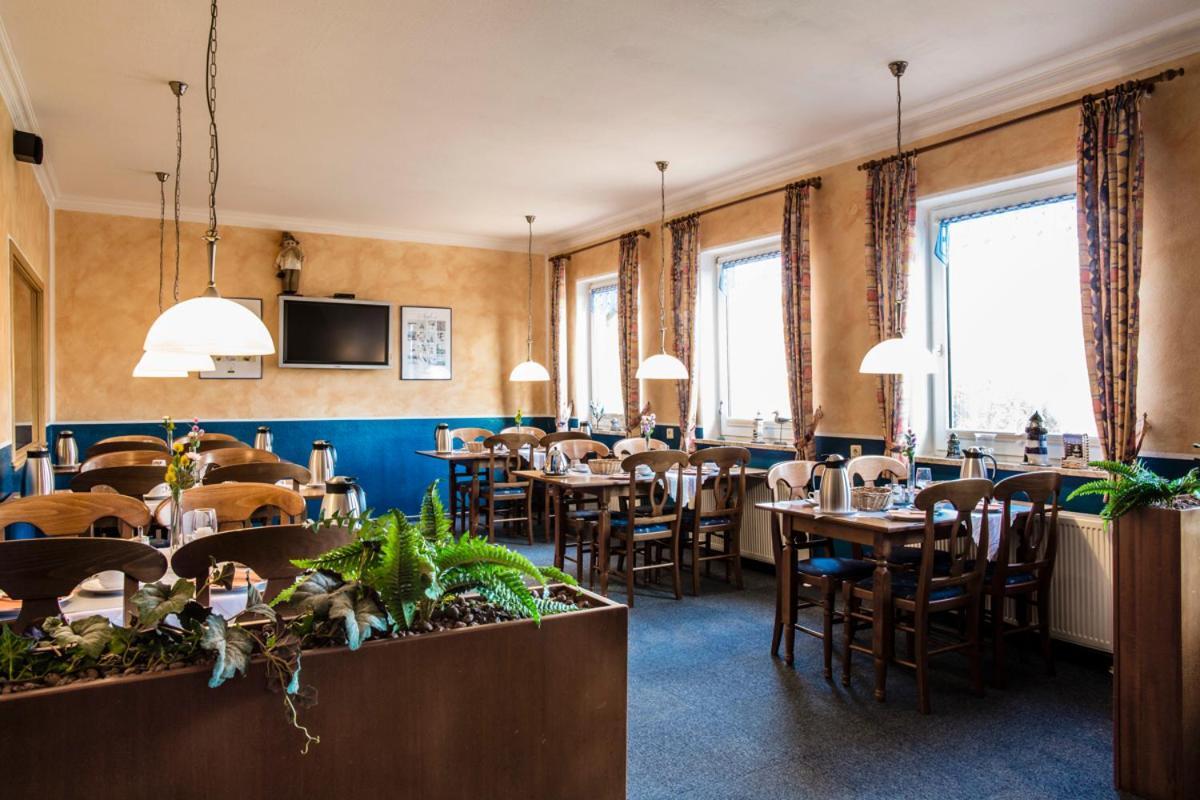 Logia Hotel garni Neuharlingersiel Esterno foto