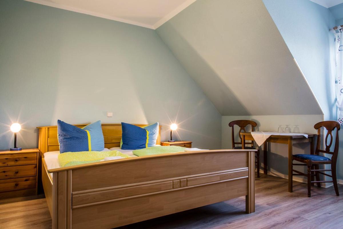 Logia Hotel garni Neuharlingersiel Esterno foto