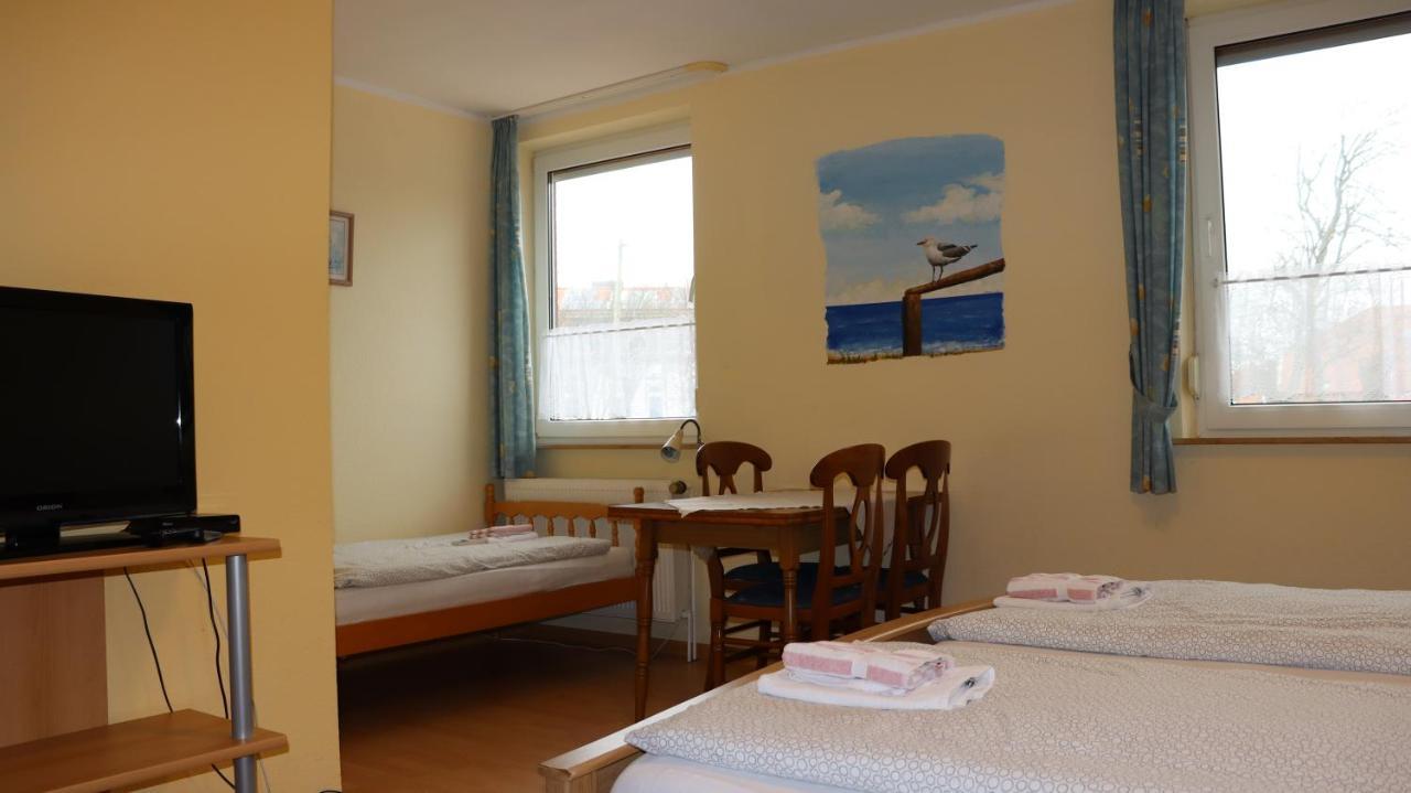 Logia Hotel garni Neuharlingersiel Esterno foto
